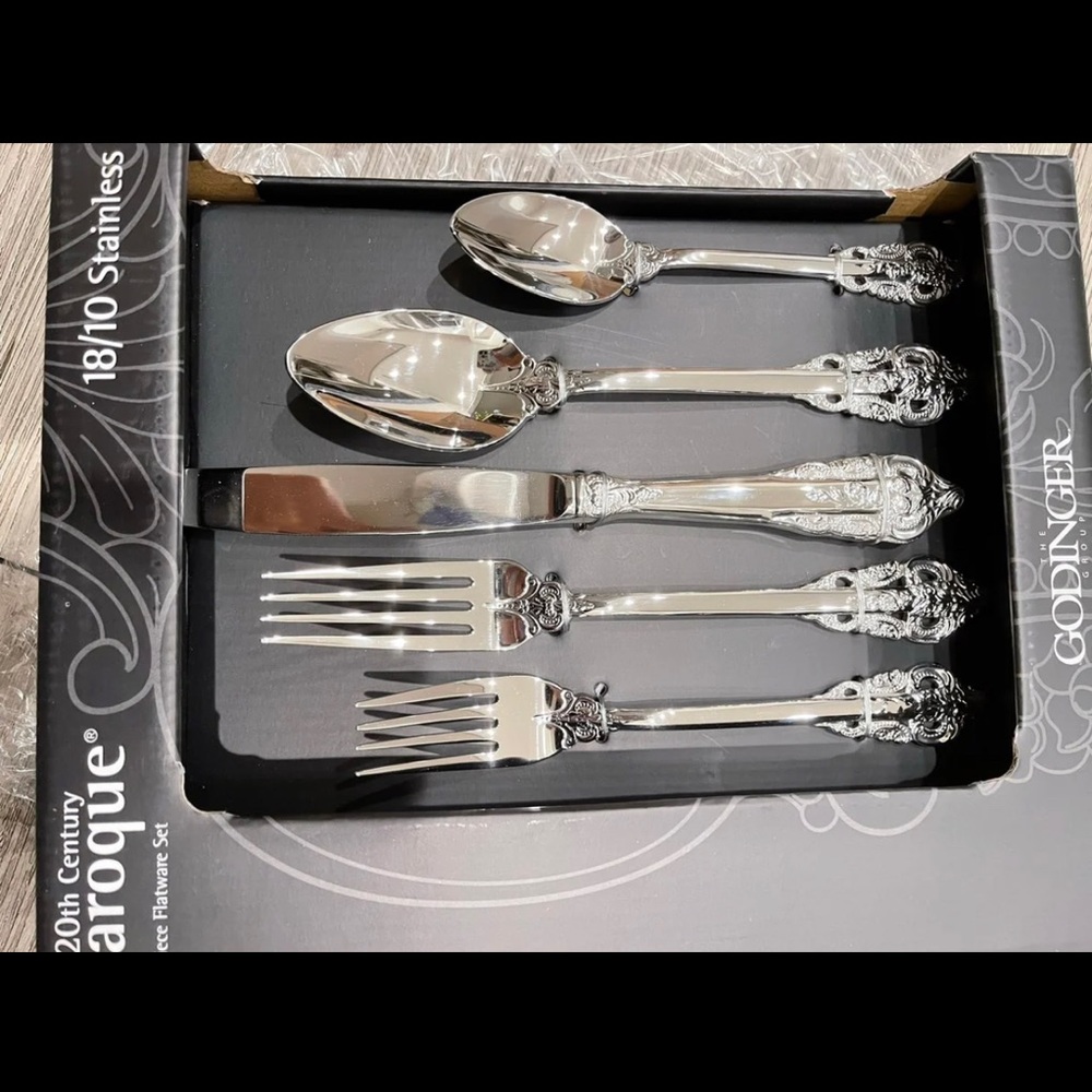 Godinger 20th Century Baroque 20piece flatware set (two set for sale)